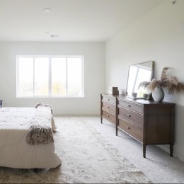 Bedroom with natural lighting and high ceilings at The Flats at Hampden in Camp Hill, PA