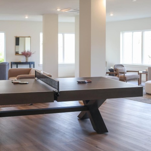a spacious room with a ping-pong table at The Flats at Hampden in Camp Hill, PA
